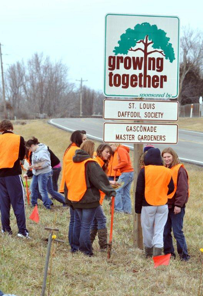 Growing Together Sign with Students